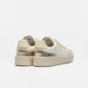 V-90 Cuero Blanco Calcaire Platine